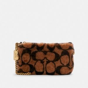 Coach x J lo Nolita Shearling bag